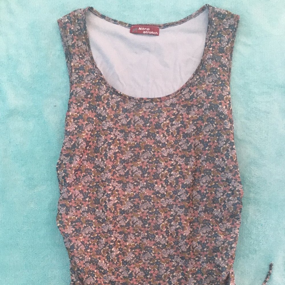 Sleeveless Floral Shirt with side ruching.